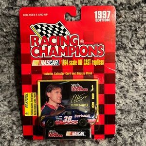 1997 NASCAR Die Cast Replica of the Barbasol car driven by Elton Sawyer. BNWT